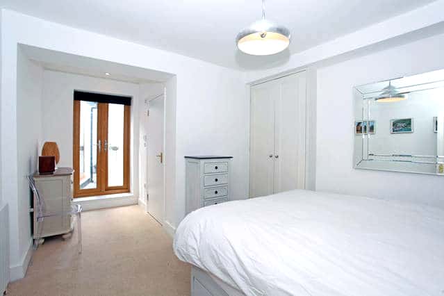 Mildmay Park Master Bedroom with view of external door